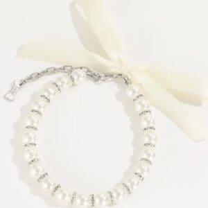 Elegant outdoor wedding ceremony setup with chairs.