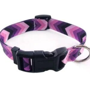 Woman in elegant green dress smiling outdoors.