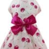 White dress with cherries and pink bow.