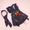 Navy dress with cherry pattern and accessories.
