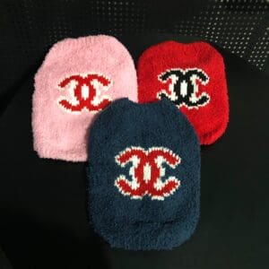 Modern kitchen with marble countertops and island.